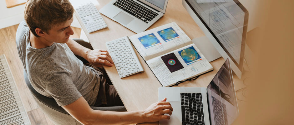 Collection of responsive HTML templates displayed on laptop and mobile screens — representing top websites to download free and premium web templates.